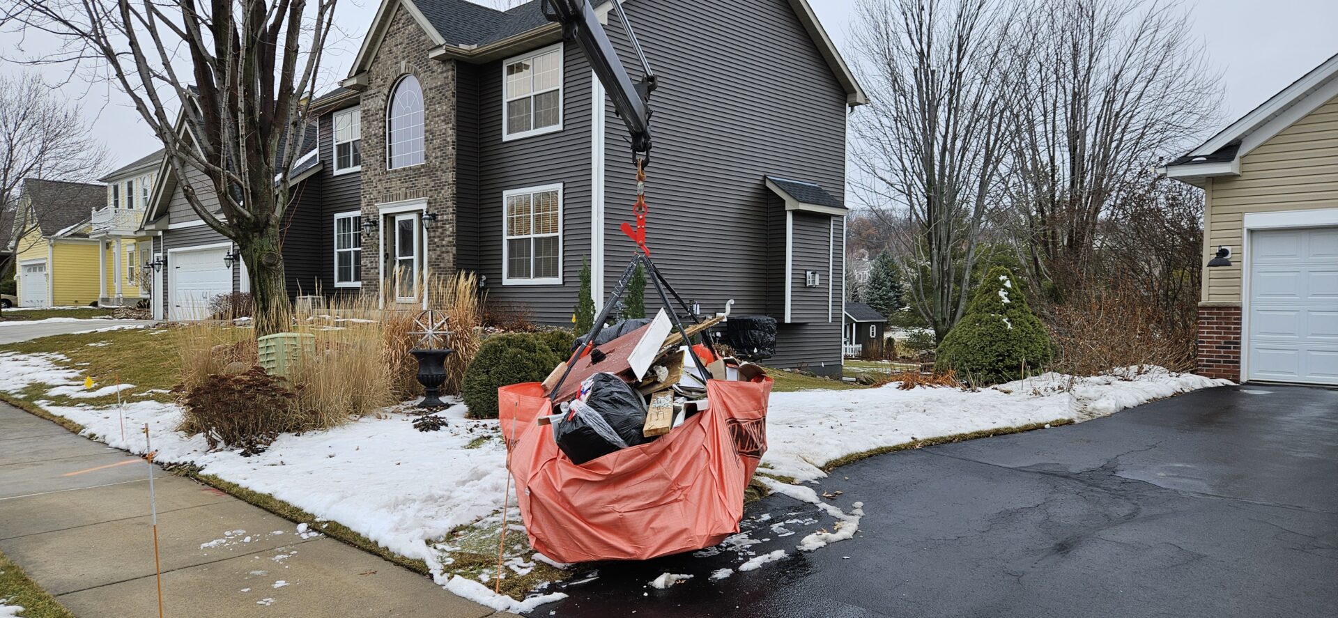 how it works - dumpster bag being picked up